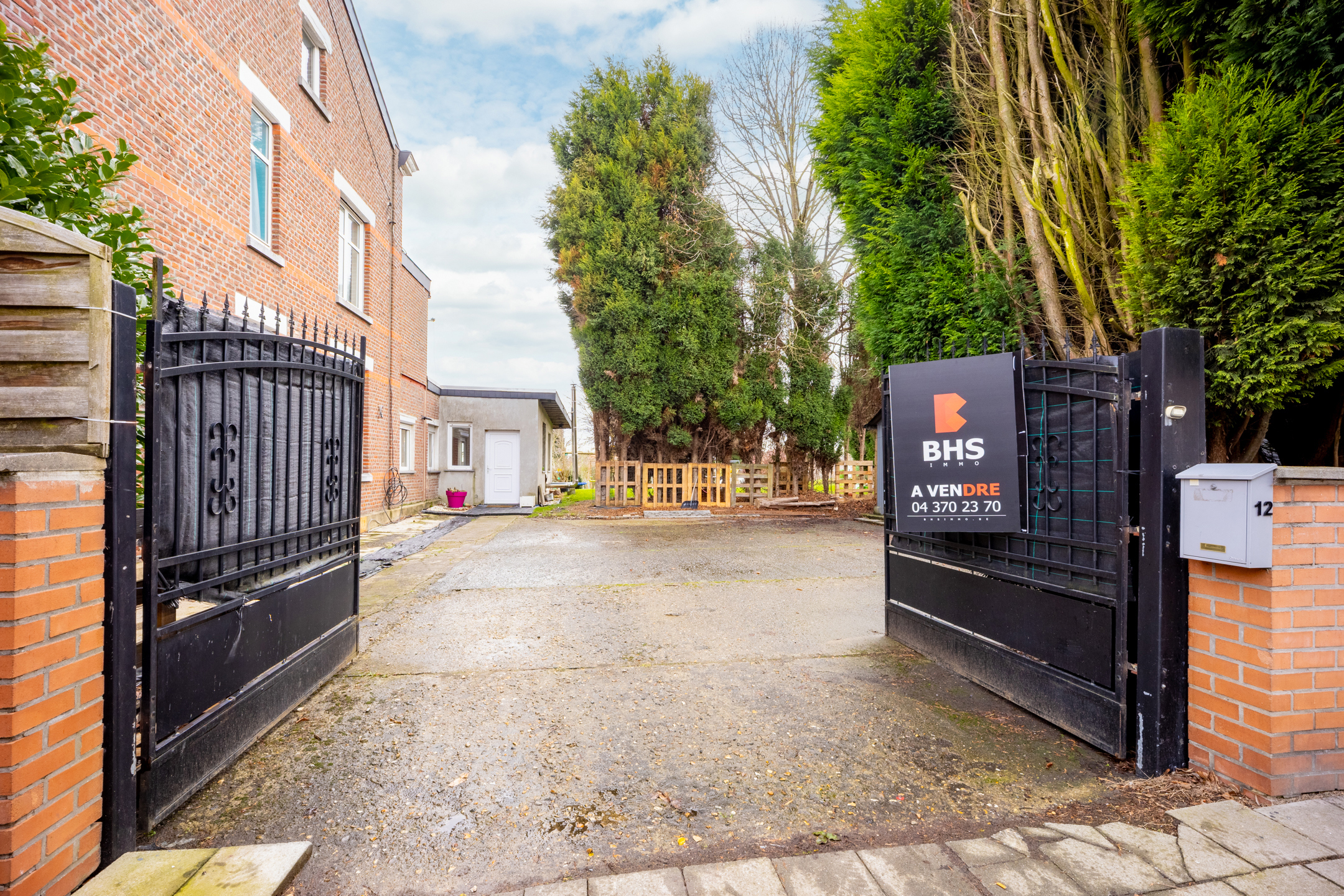 Photo du bien Ensemble immobilier ( spacieuse maison + terrain à bâtir)