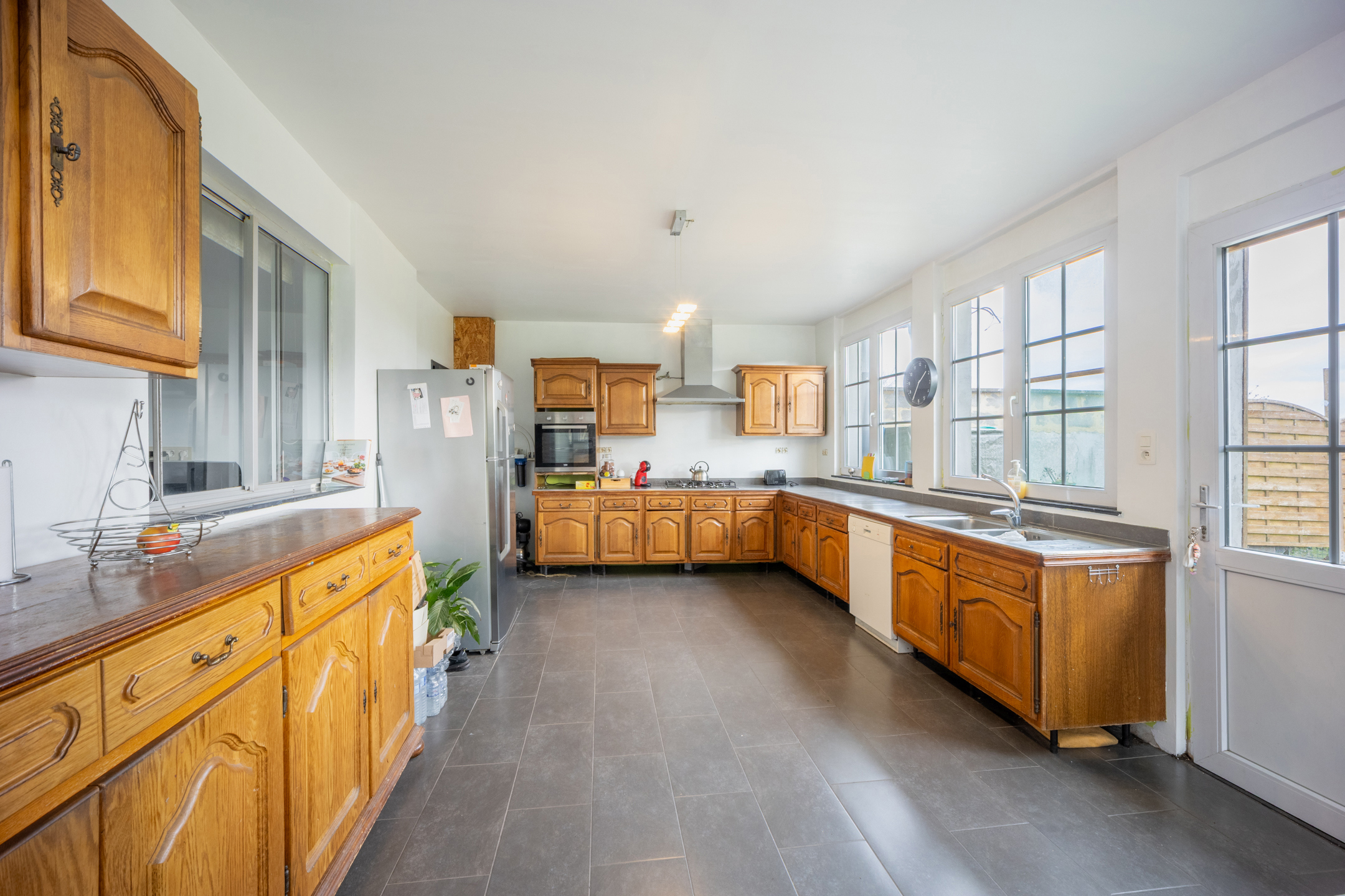 Photo du bien Ensemble immobilier ( spacieuse maison + terrain à bâtir)