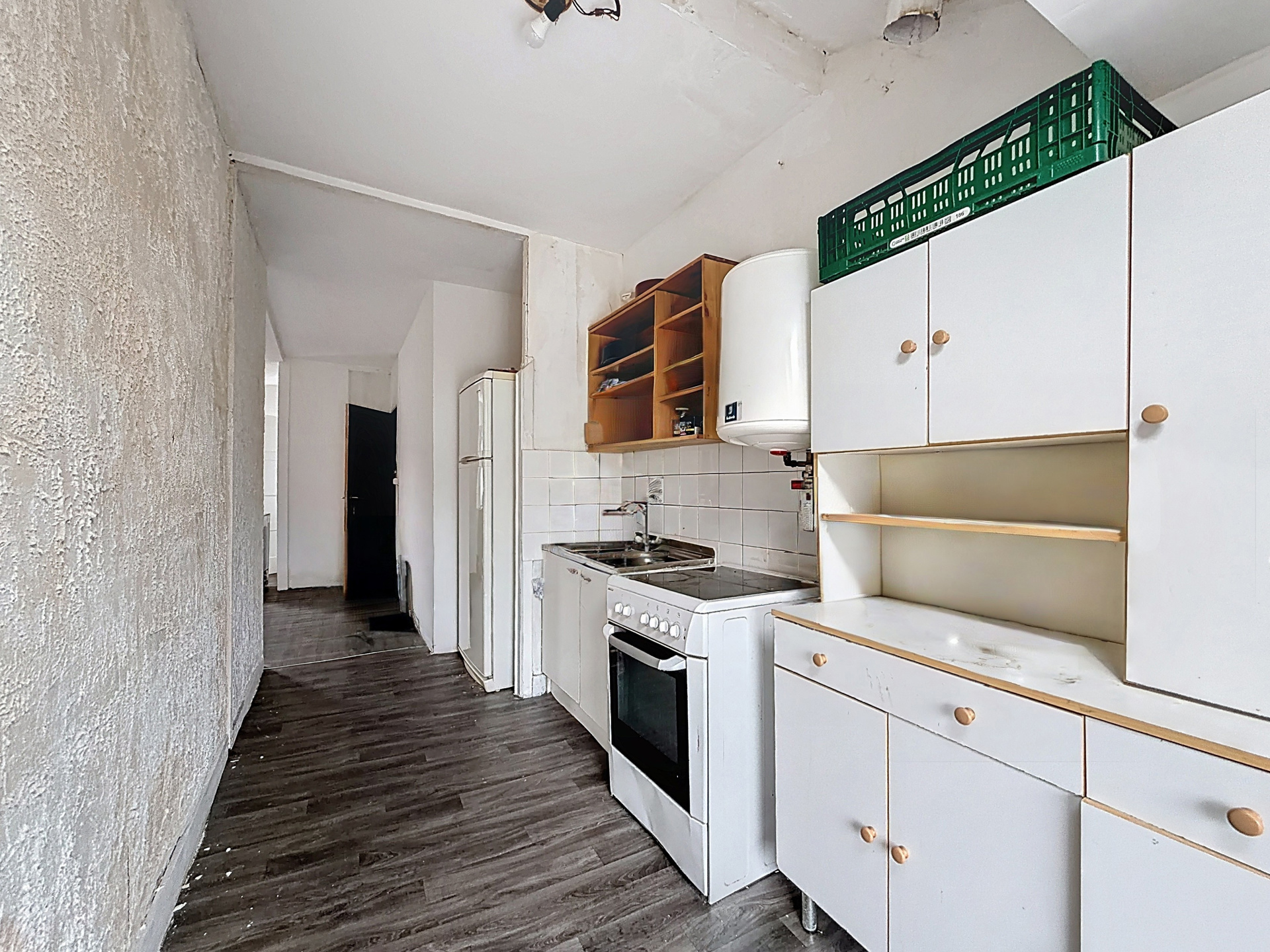 Photo du bien IMMEUBLE MIXTE 3 APPARTS et RDC COMMERCIAL (en ordre d'urbanisme)