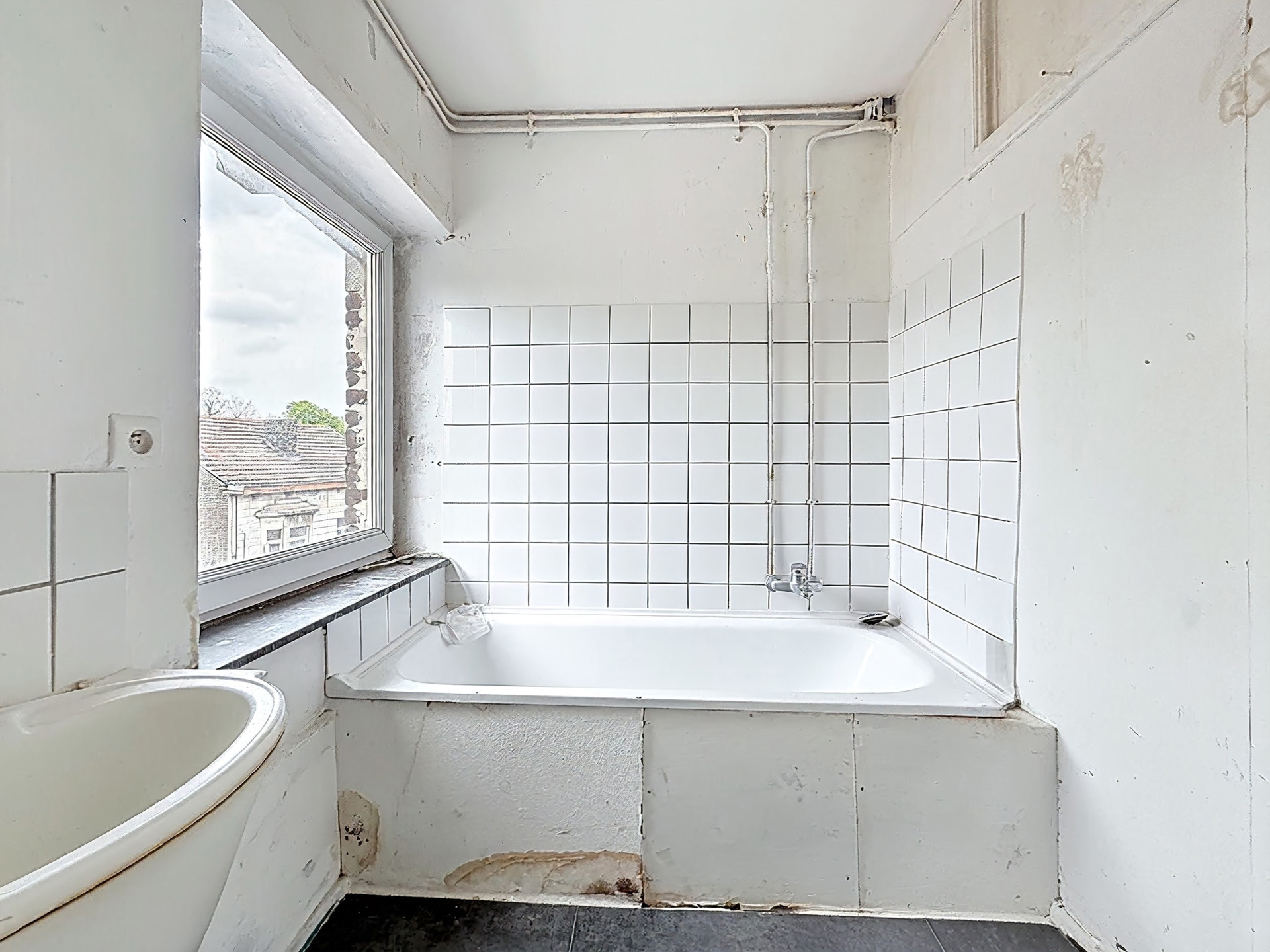 Photo du bien IMMEUBLE MIXTE 3 APPARTS et RDC COMMERCIAL (en ordre d'urbanisme)