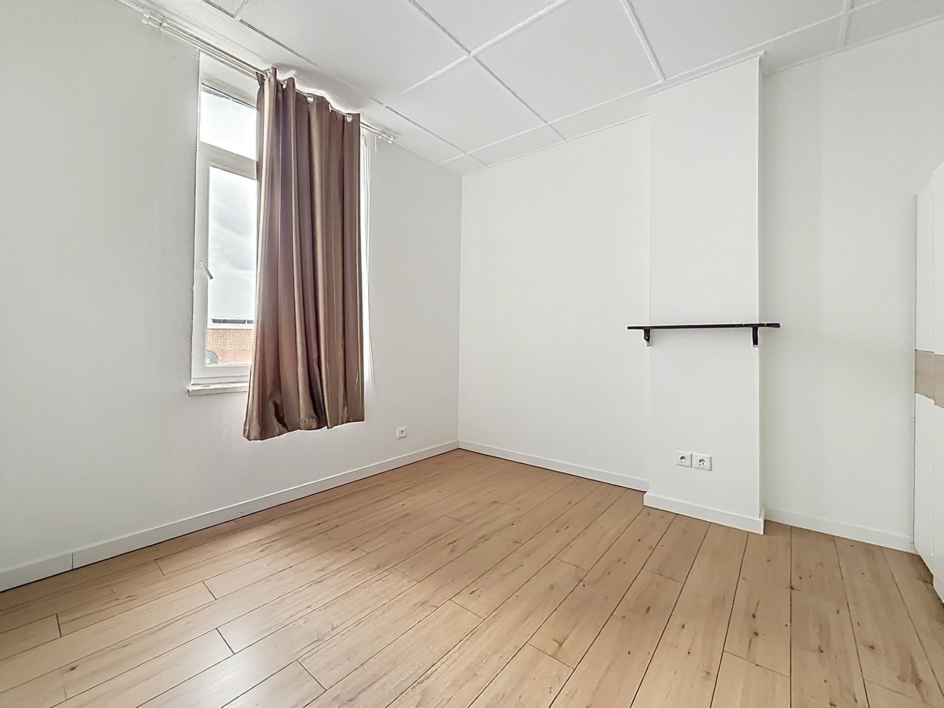 Photo du bien IMMEUBLE MIXTE 3 APPARTS et RDC COMMERCIAL (en ordre d'urbanisme)