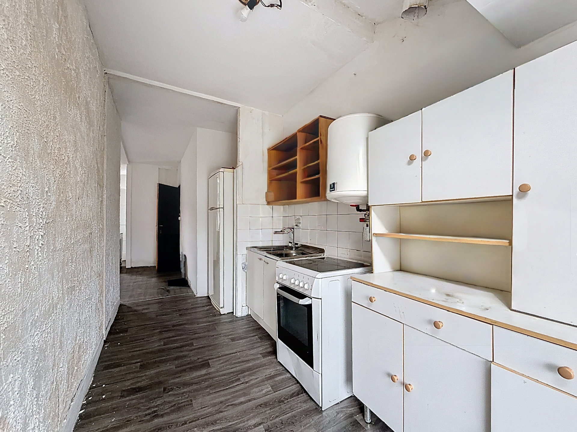 Photo du bien IMMEUBLE MIXTE 3 APPARTS et RDC COMMERCIAL (en ordre d'urbanisme)