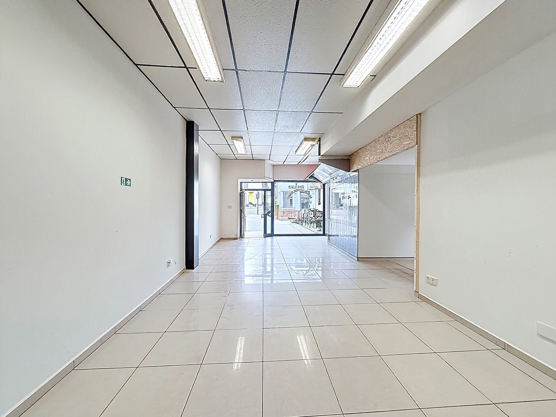 Photo du bien IMMEUBLE MIXTE 3 APPARTS et RDC COMMERCIAL (en ordre d'urbanisme)