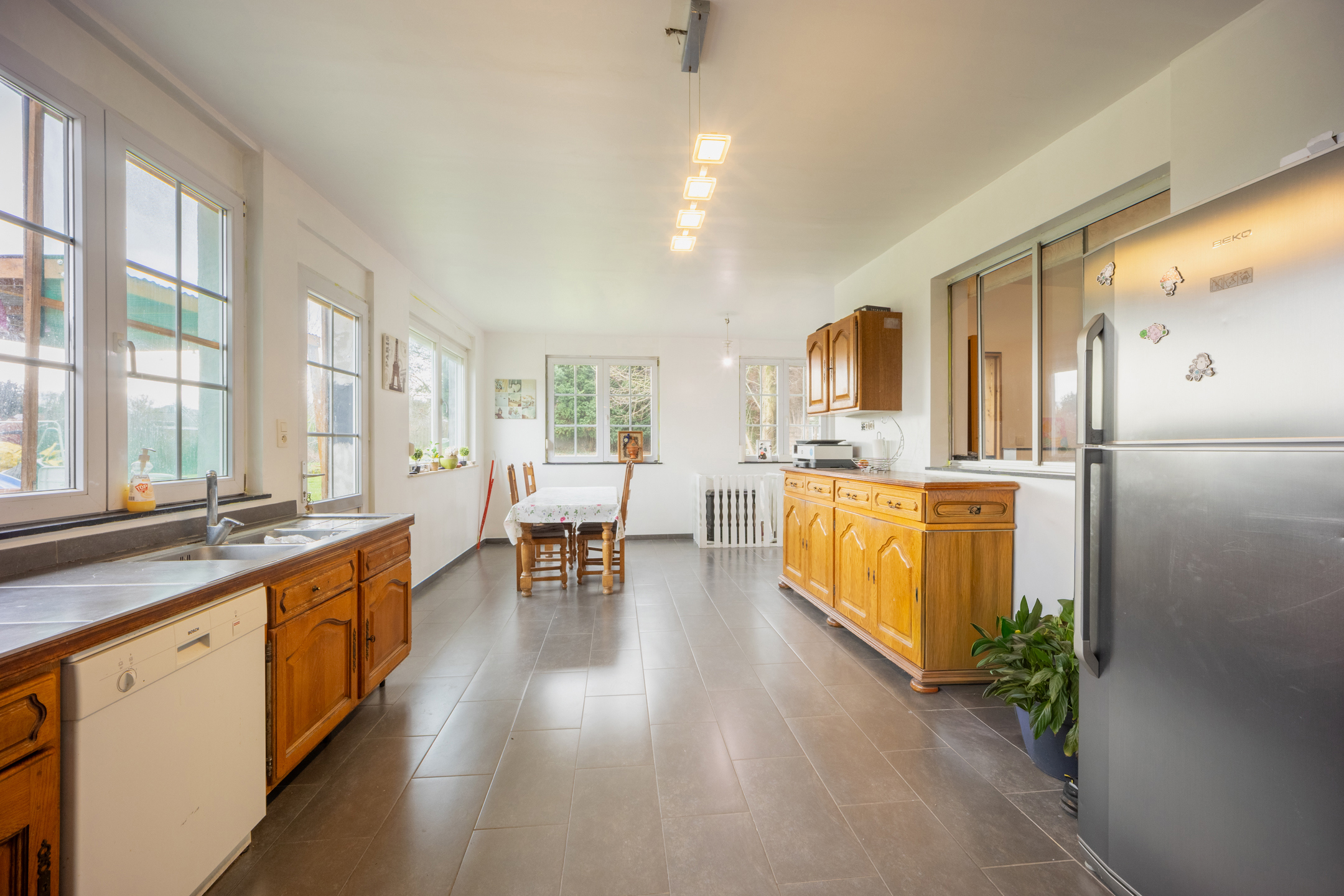 Photo du bien Ensemble immobilier ( spacieuse maison + terrain à bâtir)